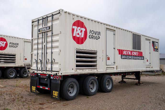 Rear view of two CAT XQ2000 trailered generator set with T&T Power Group Branding