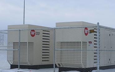 Two 500kw diesel generators, outdoors in weatherproof enclosures